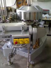 Machines for filling and closing of cans, tins
